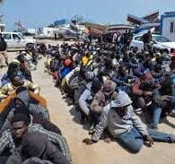 migrants arrested and assembled