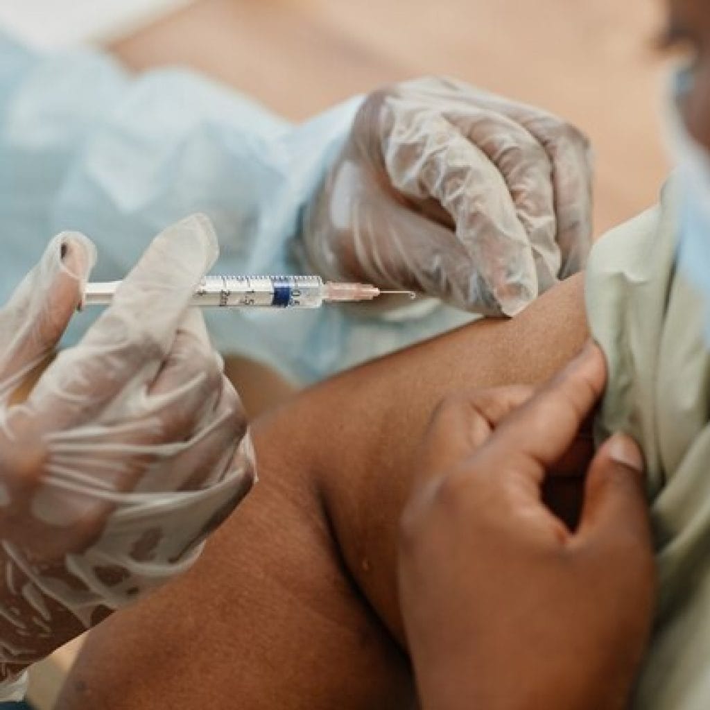 Cabo Verde, Mauritius, Seychelles eliminate measles and rubella: WHO closeup image africanamerican woman getting vaccinated medical clinic coronavirus pa 236854 32860